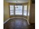 Inviting dining area with bay windows, allowing for natural light and charming views at 104 Oak Bend Dr, Stockbridge, GA 30281
