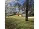 Charming home with a well-manicured front yard at 104 Oak Bend Dr, Stockbridge, GA 30281