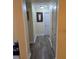 Clean hallway featuring hard wood floors and neutral paint at 104 Oak Bend Dr, Stockbridge, GA 30281
