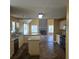 Open-concept kitchen featuring a stone backsplash, granite counters, and stainless appliances at 104 Oak Bend Dr, Stockbridge, GA 30281