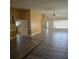 Expansive living room with wood-look tile flooring and tons of natural light at 104 Oak Bend Dr, Stockbridge, GA 30281