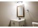 Bathroom with vanity, framed mirror, and modern fixtures at 1393 Vesta Ave, Atlanta, GA 30344