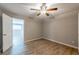 Bedroom featuring a ceiling fan and wood floor at 1393 Vesta Ave, Atlanta, GA 30344