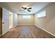 Spacious bedroom with a ceiling fan, recessed lighting, and an ensuite bathroom, perfect for relaxation at 1393 Vesta Ave, Atlanta, GA 30344