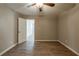 Bedroom featuring wood flooring and a ceiling fan at 1393 Vesta Ave, Atlanta, GA 30344