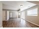 Spacious living room features hardwood floors and neutral paint, offering bright and airy space at 1393 Vesta Ave, Atlanta, GA 30344