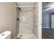 Shower with white and gray marble style tile at 1393 Vesta Ave, Atlanta, GA 30344