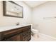 Nicely updated bathroom features a modern vanity, mirror, and tile flooring at 1780 Brewer Sw Blvd, Atlanta, GA 30310