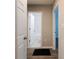 Bathroom view through doorway with white tile shower and tub at 1780 Brewer Sw Blvd, Atlanta, GA 30310