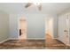 Bright bedroom with wood-look flooring, access to the bath and closet at 1780 Brewer Sw Blvd, Atlanta, GA 30310