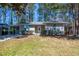 Charming single-story home featuring a well-maintained lawn and inviting front entrance at 1780 Brewer Sw Blvd, Atlanta, GA 30310