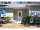 Inviting front entrance with an oval window door and manicured landscaping at 1780 Brewer Sw Blvd, Atlanta, GA 30310