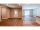 Open-concept living space showcasing hardwood floors and natural light at 1780 Brewer Sw Blvd, Atlanta, GA 30310