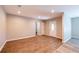 Bright living room featuring hardwood floors and a neutral color palette at 1780 Brewer Sw Blvd, Atlanta, GA 30310