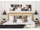 Elegant bedroom showcasing a rattan headboard, modern art, and unique pendant lighting at 206 Reinhardt St Se, Atlanta, GA 30312