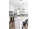 Contemporary kitchen with a center island, modern appliances and black and white accents at 206 Reinhardt St Se, Atlanta, GA 30312