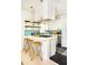 Modern kitchen with island, stainless steel appliances, and eat-in breakfast bar at 206 Reinhardt St Se, Atlanta, GA 30312
