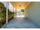 A covered back porch with a concrete floor and a view of the backyard shed at 264 Silver Springs Sw Cir, Atlanta, GA 30310