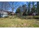 An expansive backyard with mature trees and plenty of space for outdoor recreation at 264 Silver Springs Sw Cir, Atlanta, GA 30310