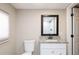 Bathroom featuring a granite countertop vanity and modern fixtures at 264 Silver Springs Sw Cir, Atlanta, GA 30310