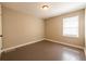 Empty bedroom with a window and neutral paint at 264 Silver Springs Sw Cir, Atlanta, GA 30310