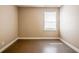 Empty room with a window and base trim at 264 Silver Springs Sw Cir, Atlanta, GA 30310
