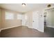 Bedroom featuring neutral walls, wood-look floors, and access to a bathroom at 264 Silver Springs Sw Cir, Atlanta, GA 30310