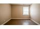 Empty bedroom with a window and neutral paint at 264 Silver Springs Sw Cir, Atlanta, GA 30310