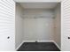 Empty walk-in closet with a metal shelving rack at 264 Silver Springs Sw Cir, Atlanta, GA 30310