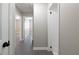 Hallway featuring neutral walls and dark flooring at 264 Silver Springs Sw Cir, Atlanta, GA 30310