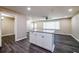Spacious open floor plan, granite island and hardwood flooring at 264 Silver Springs Sw Cir, Atlanta, GA 30310