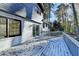 Back deck with railing, gray wood and view of trees at 2887 Hickory Ln, Snellville, GA 30078