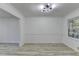 Bright dining space enhanced with hardwood flooring and recessed lighting throughout at 2887 Hickory Ln, Snellville, GA 30078