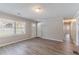 Clean, bright living room featuring plank floors, neutral wall color, and natural lighting at 4089 Lindsey Dr, Decatur, GA 30035
