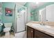 This bathroom offers a standing shower with glass doors, tile flooring and a marble countertop sink at 1401 Keys Crossing Ne Dr, Atlanta, GA 30319