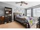 Cozy bedroom featuring a comfy bed, bookshelf, and ample natural light at 1401 Keys Crossing Ne Dr, Atlanta, GA 30319