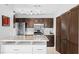 Kitchen featuring an island with marble countertop, stainless steel appliances, and custom cabinetry at 1401 Keys Crossing Ne Dr, Atlanta, GA 30319
