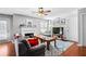 Open concept living room with hardwood floors, fireplace, and neutral paint at 1401 Keys Crossing Ne Dr, Atlanta, GA 30319