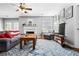 Bright living room area with fireplace, hardwood floors, and lots of natural light at 1401 Keys Crossing Ne Dr, Atlanta, GA 30319