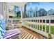 This patio offers outdoor seating and a scenic view of trees at 1401 Keys Crossing Ne Dr, Atlanta, GA 30319