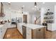Bright kitchen featuring an island, stainless steel appliances, and ample storage space at 557 Stone Field Nw Run, Marietta, GA 30060