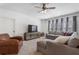 Cozy living room with a comfortable gray sectional sofa and a flat-screen TV at 557 Stone Field Nw Run, Marietta, GA 30060