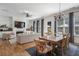 Spacious living room with hardwood floors, a fireplace, and ample natural light at 557 Stone Field Nw Run, Marietta, GA 30060
