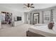 Spacious bedroom featuring a large closet, serene natural light, and comfortable carpet at 557 Stone Field Nw Run, Marietta, GA 30060