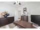 Well-appointed home office with a large desk, built-in storage, and modern decor at 557 Stone Field Nw Run, Marietta, GA 30060