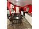 Modern kitchen with white cabinets, granite counter tops and a large island at 615 Woodruff Rd, Carrollton, GA 30116