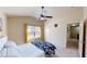 Cozy bedroom with a bed and doorway leading to the bathroom at 2409 Brynfield Cv, Suwanee, GA 30024