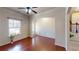 Spacious living room featuring hardwood floors, lots of light, and detailed trim at 2409 Brynfield Cv, Suwanee, GA 30024