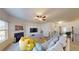 Bright and airy living room featuring a fireplace and an open concept design at 2409 Brynfield Cv, Suwanee, GA 30024
