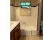 Bathroom showcasing a bathtub, tiled shower, and a sink at 406 Dallas Hwy, Villa Rica, GA 30180